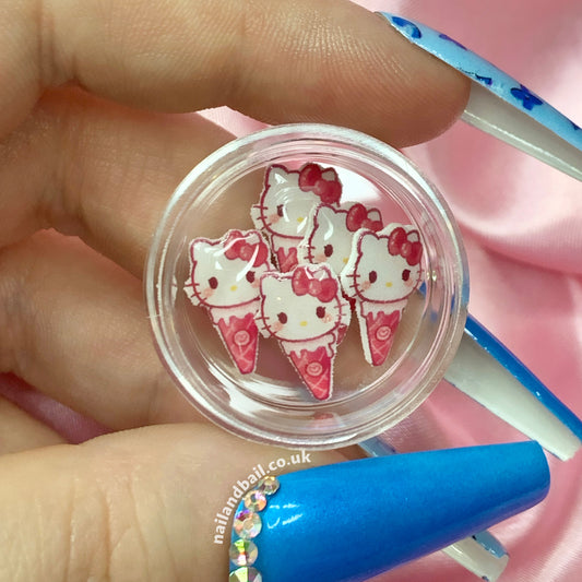 Introducing our 6pcs Handmade Pink Kitty Ice Cream Nail Charms – a charming addition to your nail art! Featuring dark pink ice cream cones with Kitty's cute face as the ice cream, these charms effortlessly add a touch of kawaii nostalgia to your manicure. Order now and let your nails become a canvas of cuteness and creativity! 🍦🎀