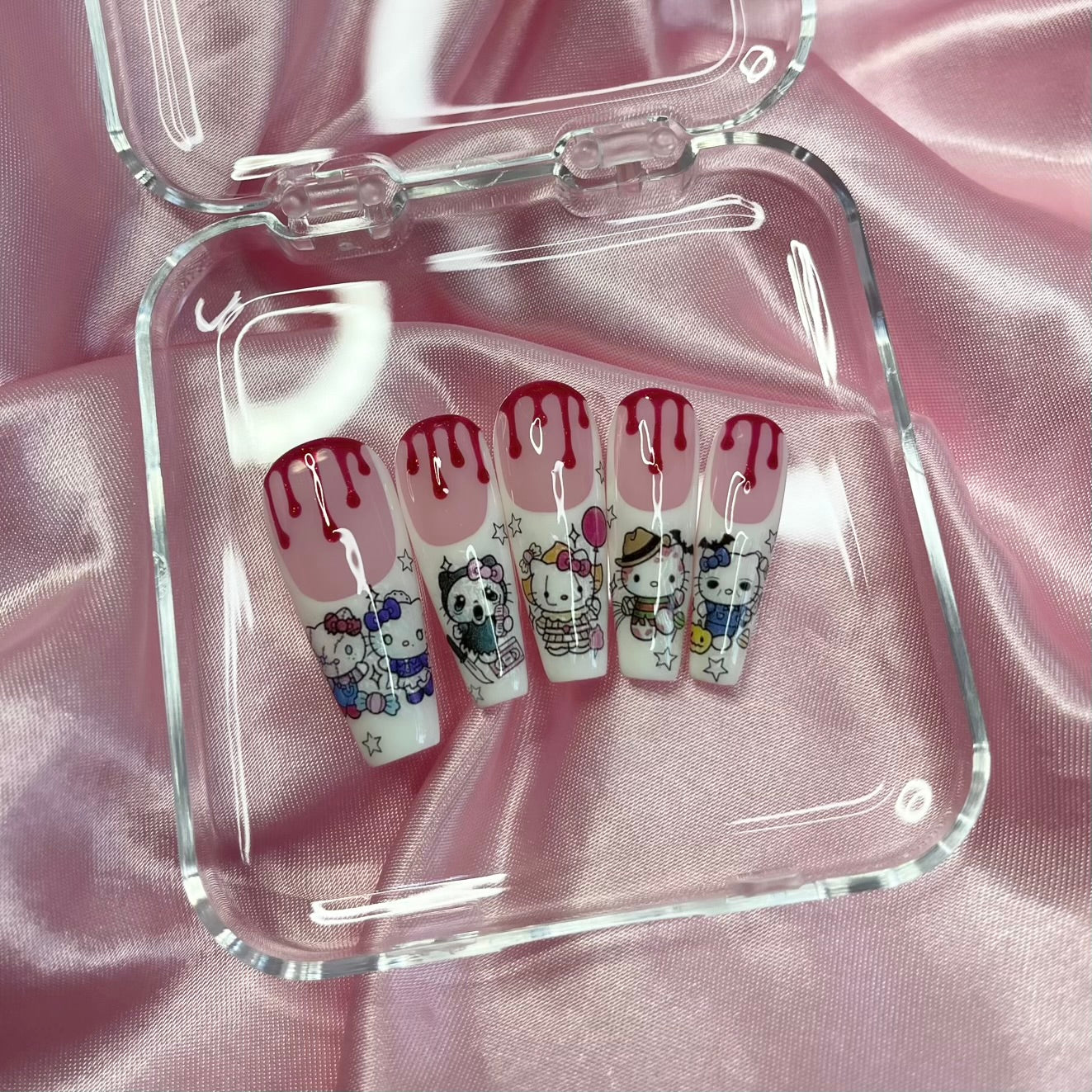 Blood drip French tip press-on nails with horror-inspired nail art