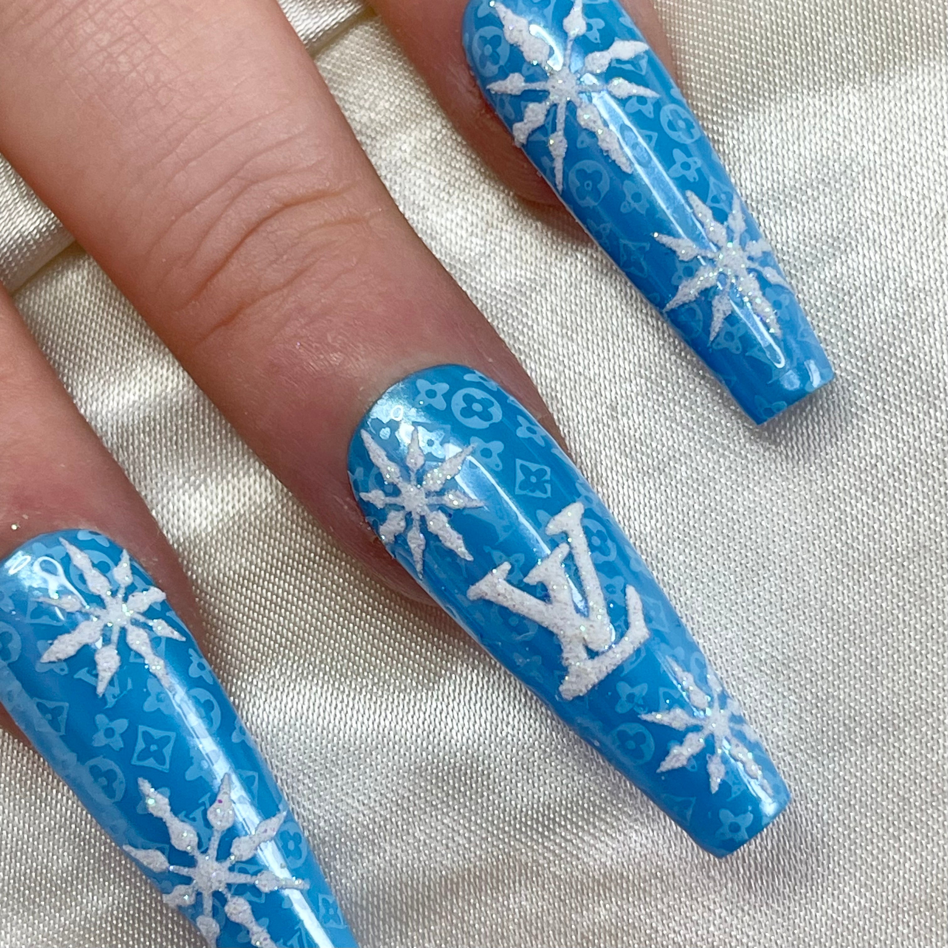 Blue chrome French tip press-on nails with glitter white bow nail art