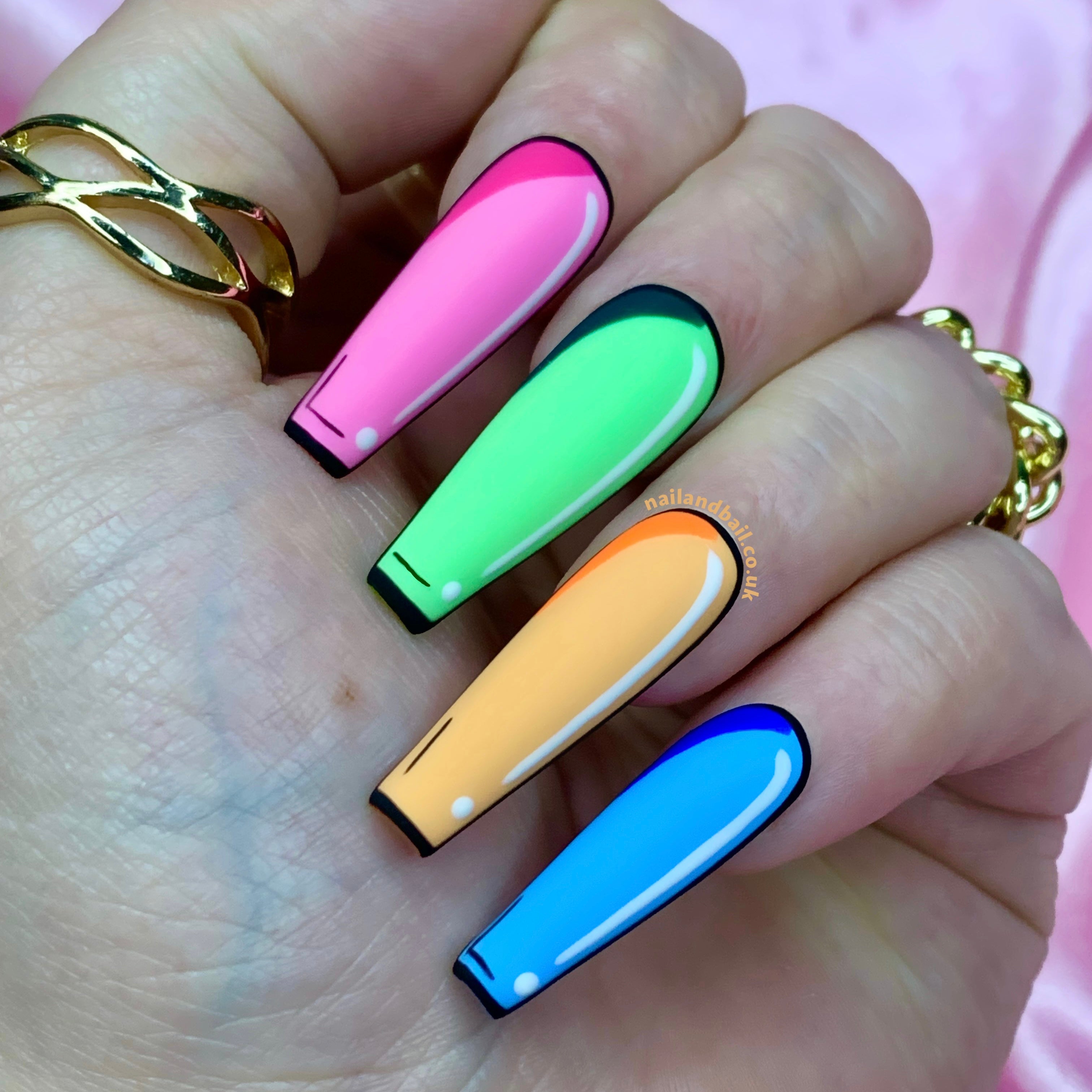 Comic book-inspired pop art nail design on matte pastel press-on nails