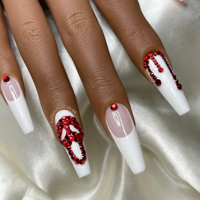 Horror-inspired press-on nails with Ghostface nail art, white French tips, and crystal details