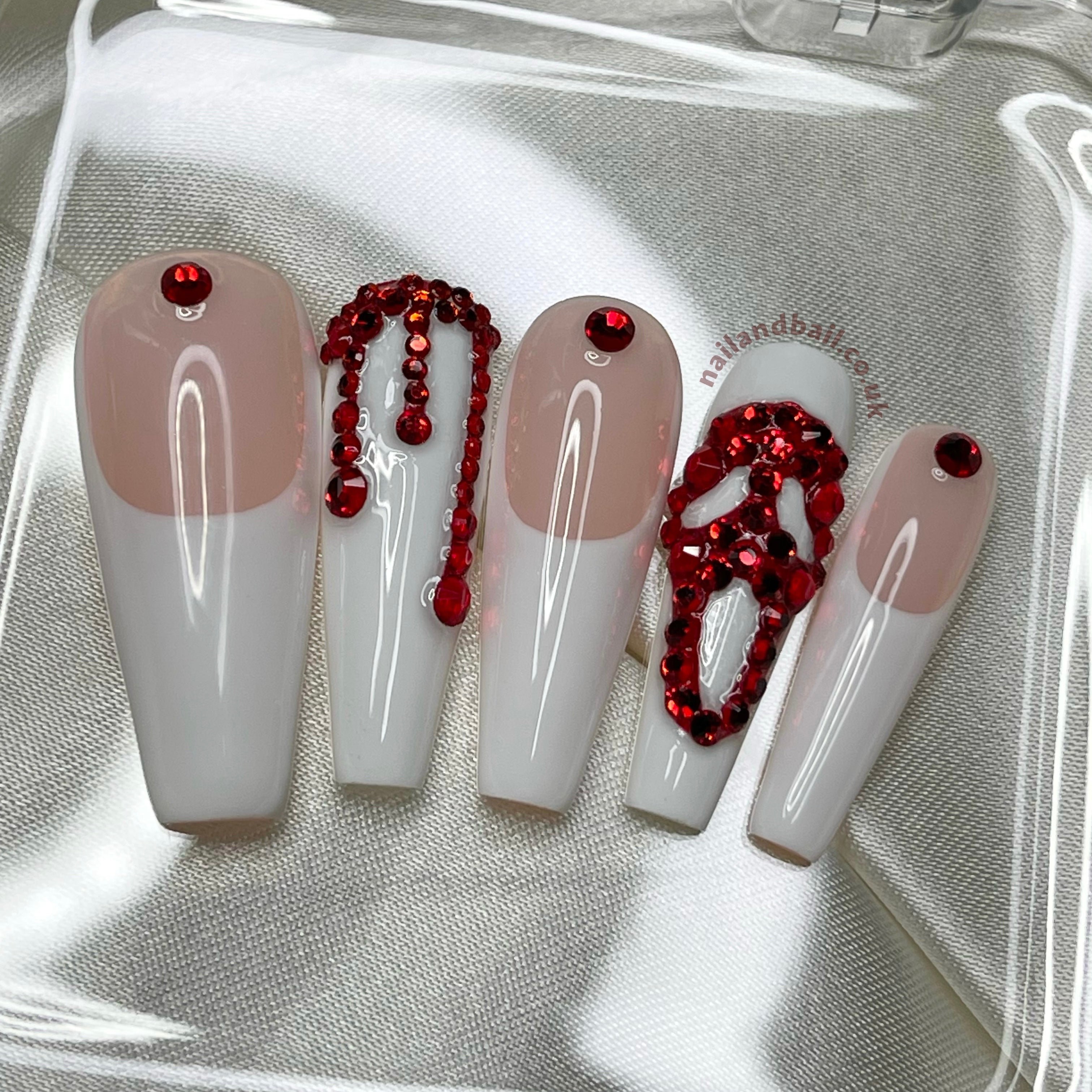 Ghostface-inspired nail art on spooky glam press-on nails