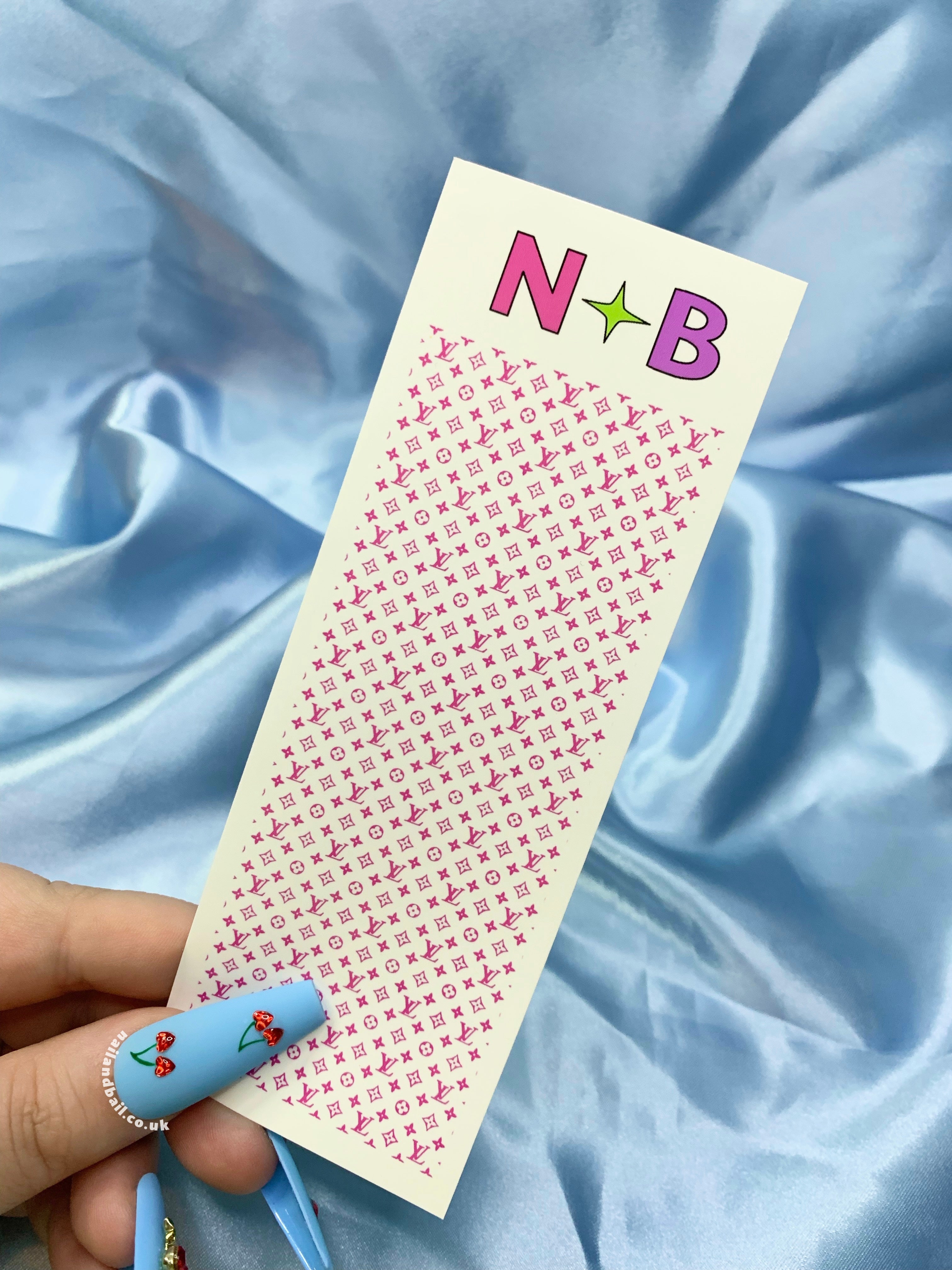 Elevate your nail game with our Bright Louis Vuitton Nail Decals, available in 6 enchanting colors: pink, green, purple, yellow, blue, and orange. Perfect for nail techs, these chic decals effortlessly add a touch of luxury to your nail art. Transform your nails into captivating canvases and let your creativity shine. Get ready to dazzle with Louis Vuitton style!