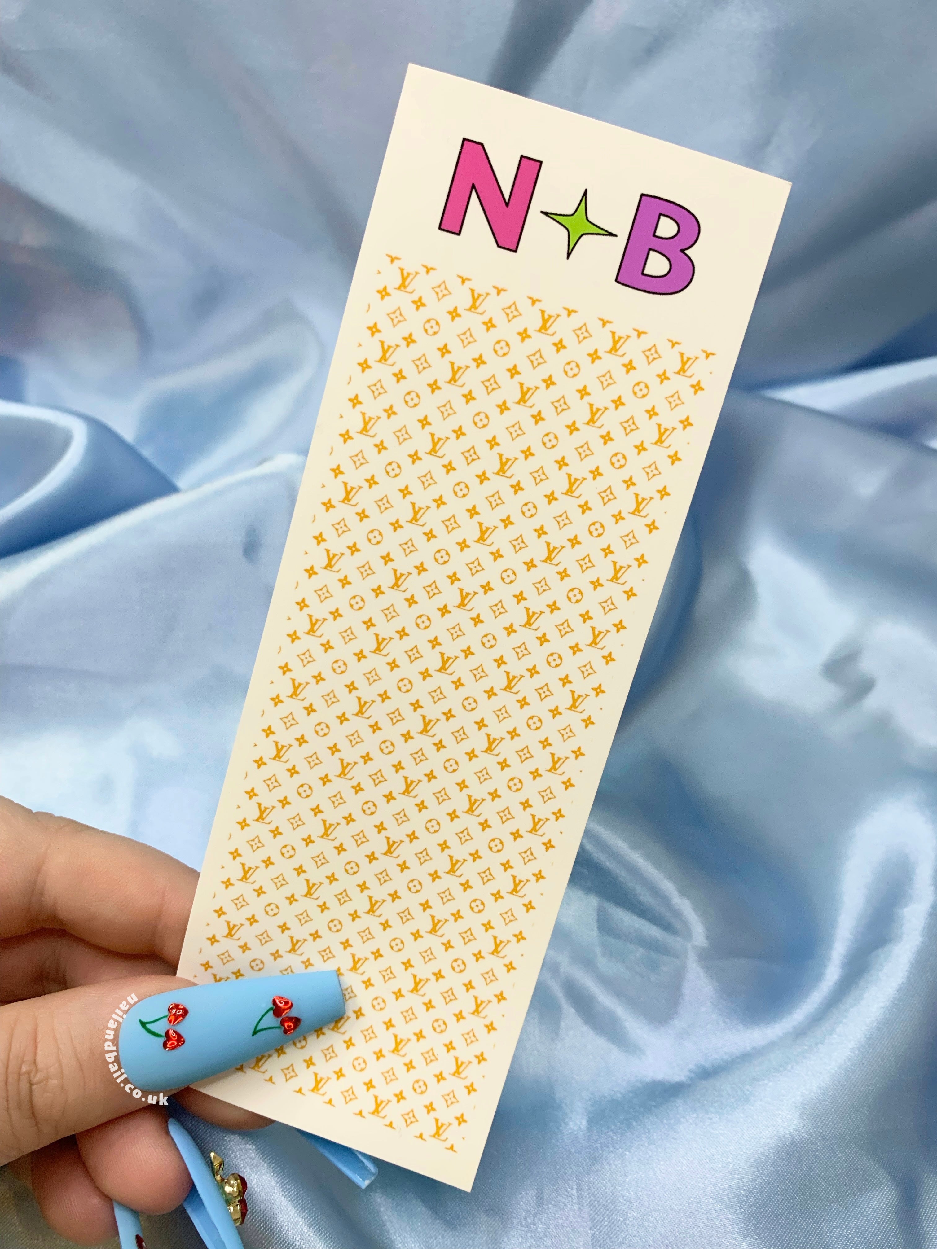 Elevate your nail game with our Bright Louis Vuitton Nail Decals, available in 6 enchanting colors: pink, green, purple, yellow, blue, and orange. Perfect for nail techs, these chic decals effortlessly add a touch of luxury to your nail art. Transform your nails into captivating canvases and let your creativity shine. Get ready to dazzle with Louis Vuitton style!