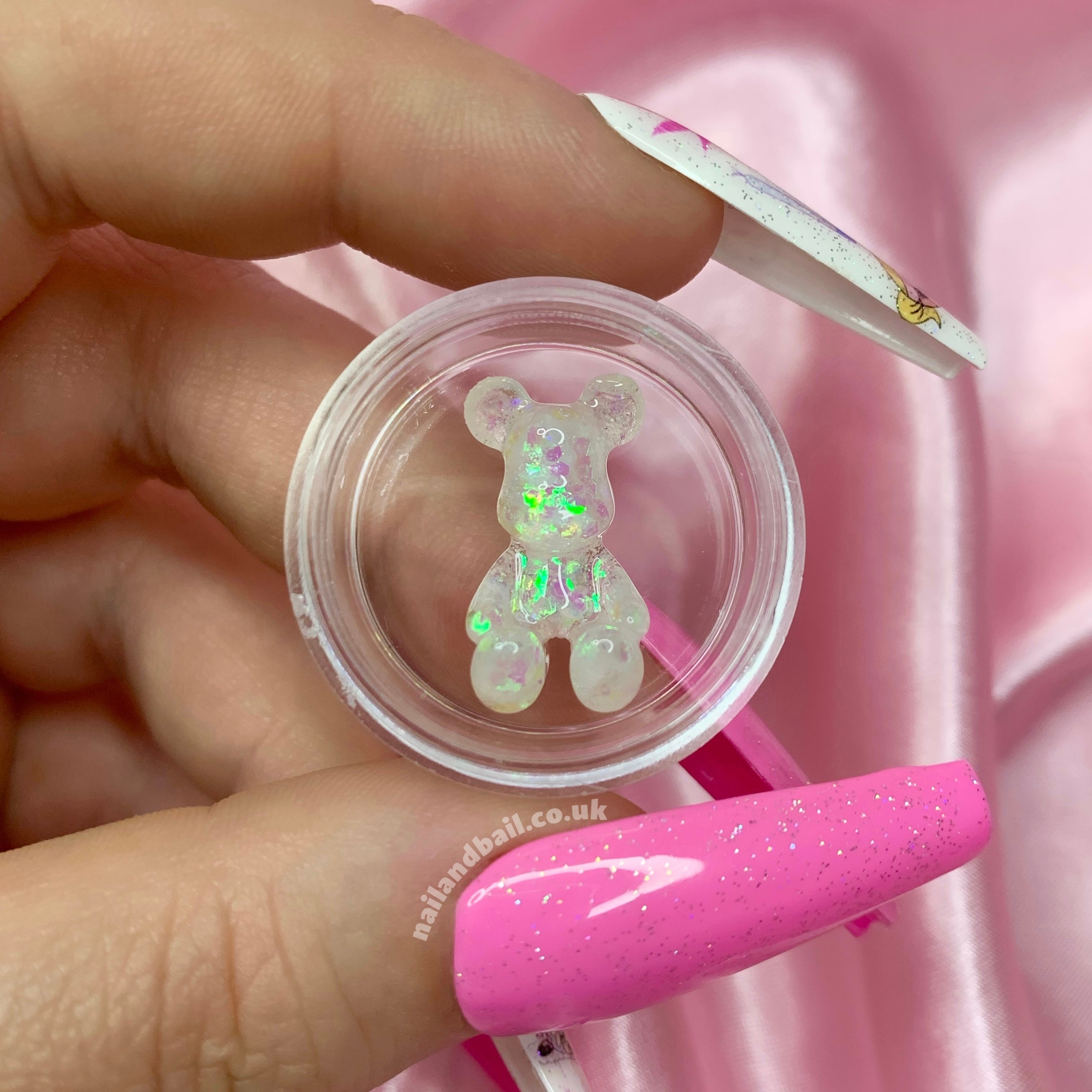 Introducing our adorable handmade Bright Glitter Bear Nail Charms, the perfect way to add a touch of whimsy and sparkle to your manicure! These charming bear-shaped nail charms are a must-have for any girly girl who loves to express her unique style.