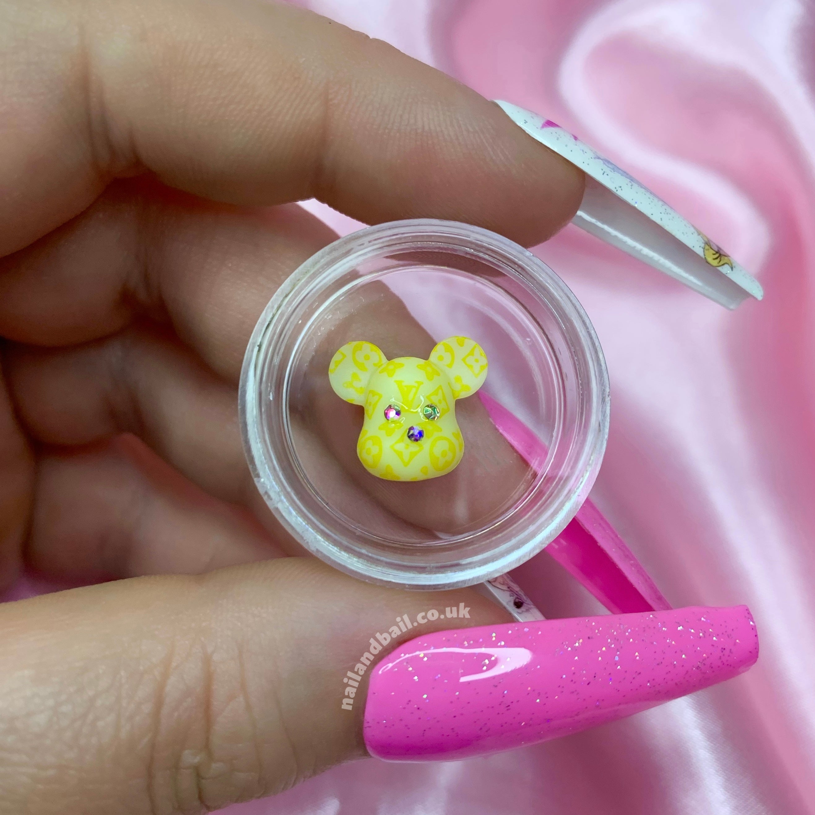 Introducing our absolutely adorable handmade Bright LV Bear Nail Charms, designed to add a touch of cuteness and sparkle to your nails! These charming little bears are the perfect accessory for any nail art enthusiast who loves all things girly.