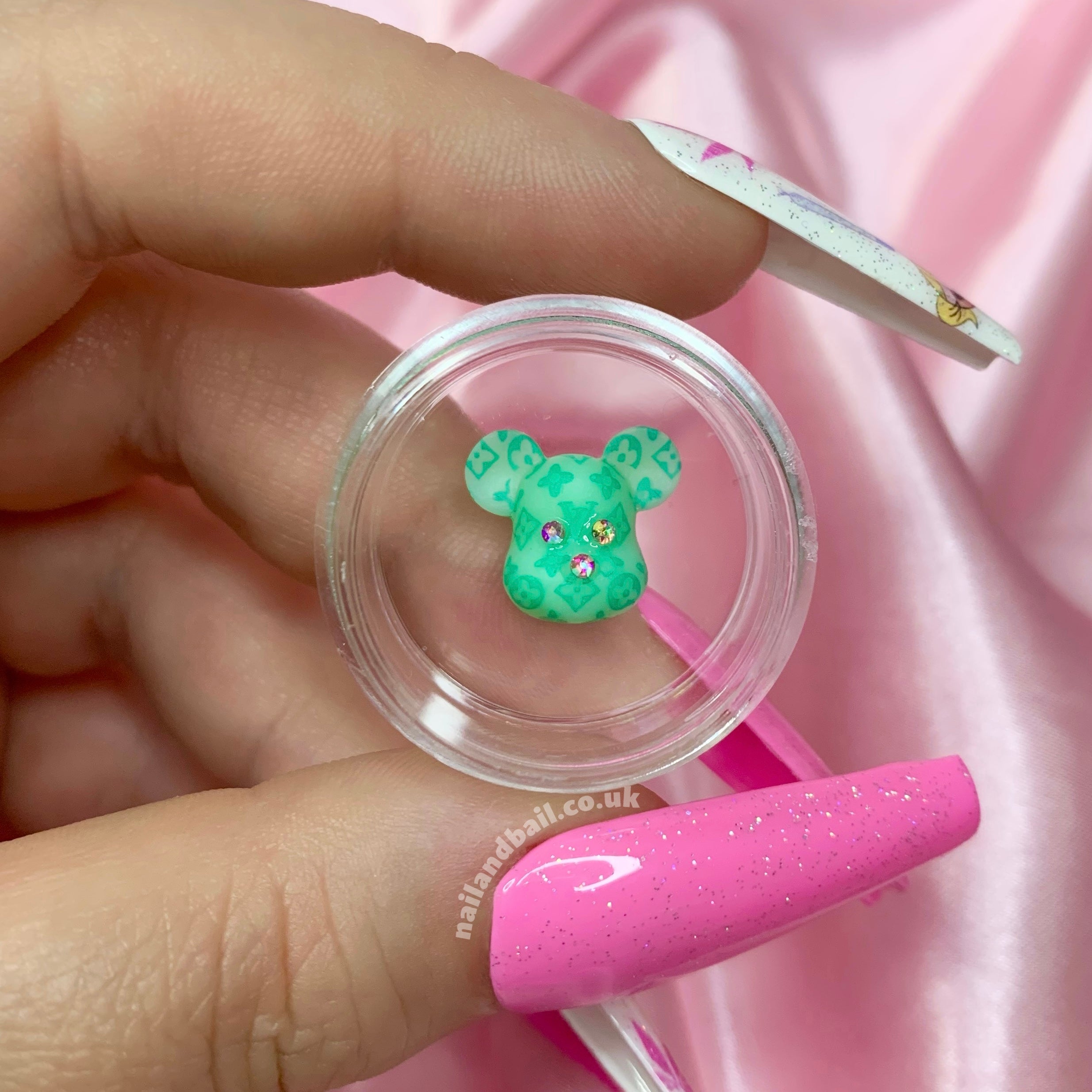Introducing our absolutely adorable handmade Bright LV Bear Nail Charms, designed to add a touch of cuteness and sparkle to your nails! These charming little bears are the perfect accessory for any nail art enthusiast who loves all things girly.