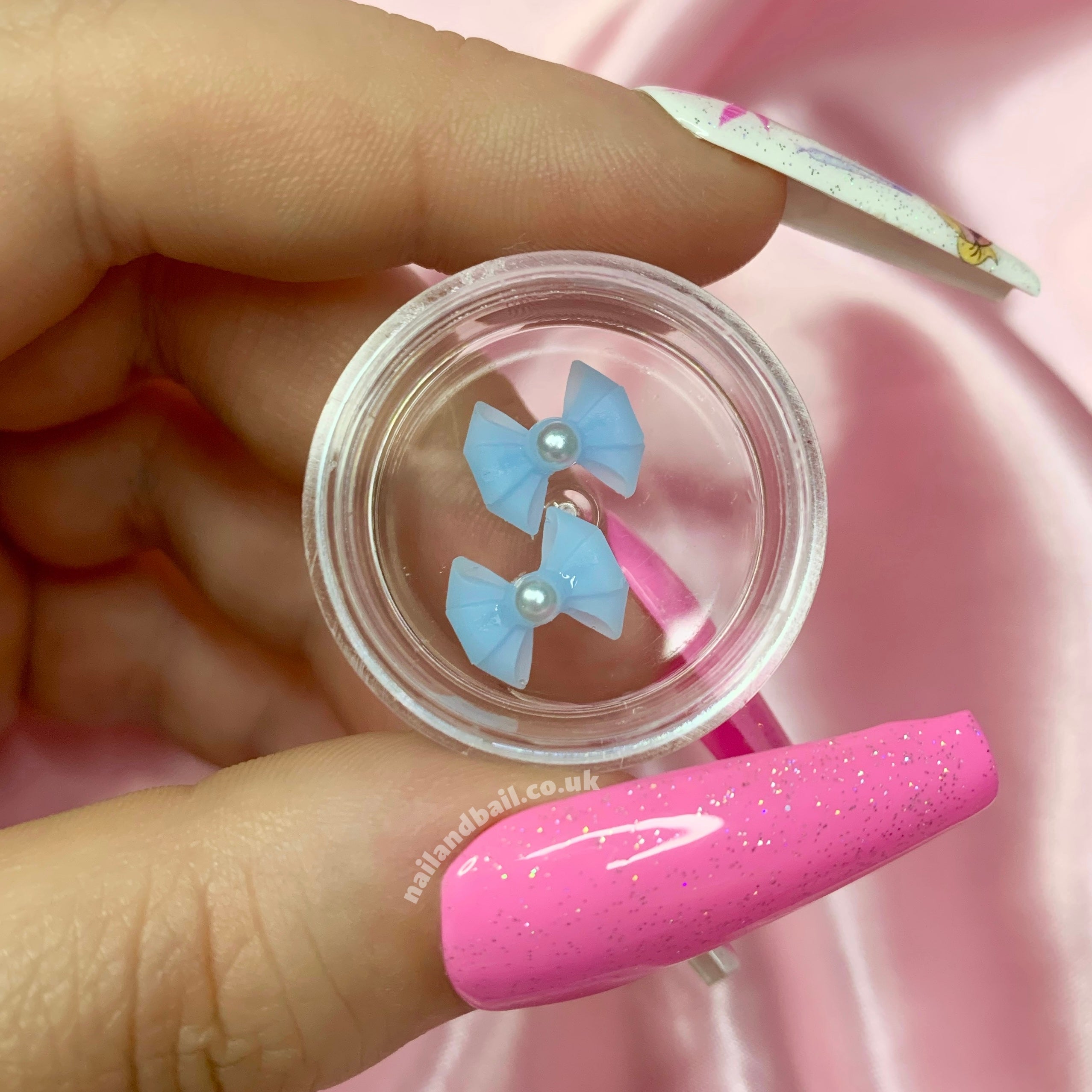 Introducing our adorable Handmade Pastel Pearl Bow Nail Charms, perfect for adding a touch of girly charm to your nails! These dainty nail charms are meticulously crafted with love and attention to detail, making them the must-have accessory for any nail enthusiast.