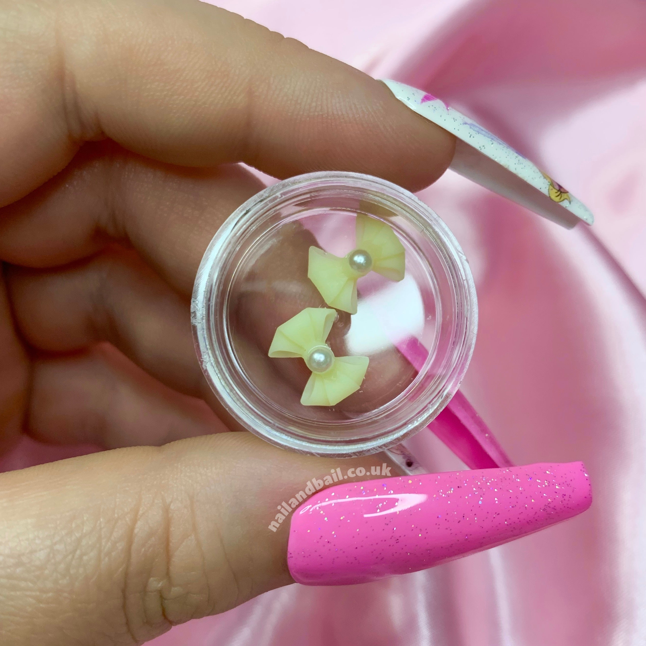 Introducing our adorable Handmade Pastel Pearl Bow Nail Charms, perfect for adding a touch of girly charm to your nails! These dainty nail charms are meticulously crafted with love and attention to detail, making them the must-have accessory for any nail enthusiast.