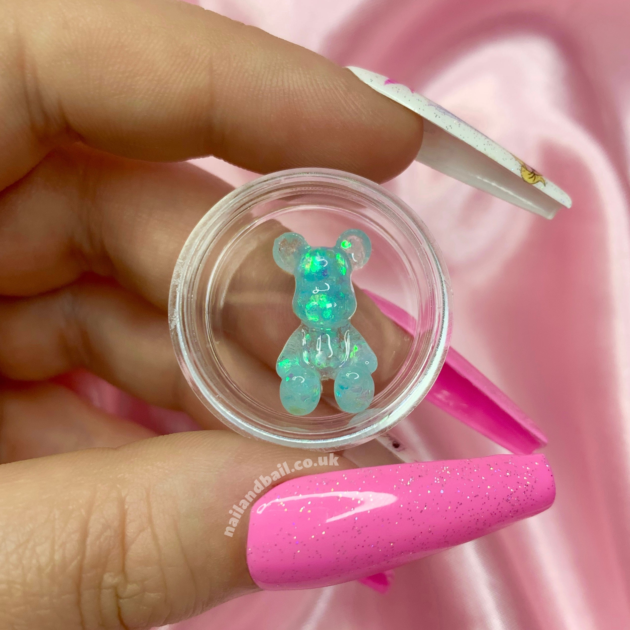 Introducing our adorable handmade Bright Glitter Bear Nail Charms, the perfect way to add a touch of whimsy and sparkle to your manicure! These charming bear-shaped nail charms are a must-have for any girly girl who loves to express her unique style.