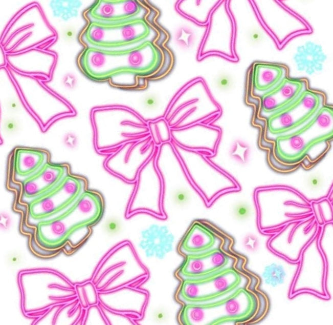 Neon Noel nail decals featuring bright pink bows and glowing Christmas tree cookies with pastel lights