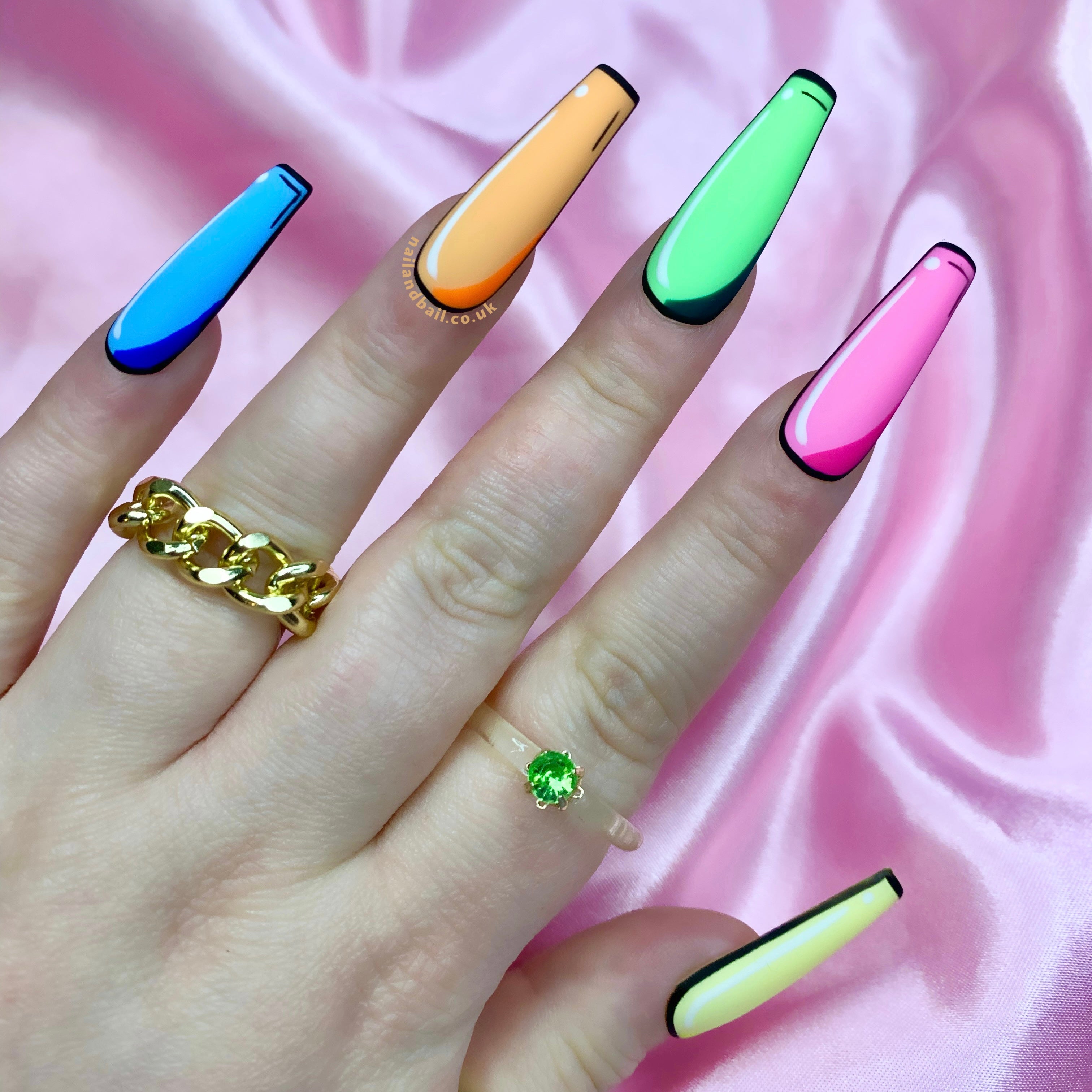 Matte pastel pop art press-on nails inspired by comic book nail art