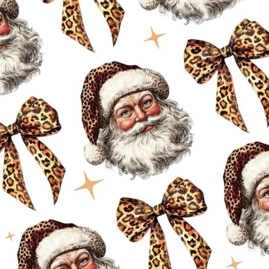 Santa’s Gone Wild nail decals featuring Santa in brown printed hats with leopard print bows and golden sparkles