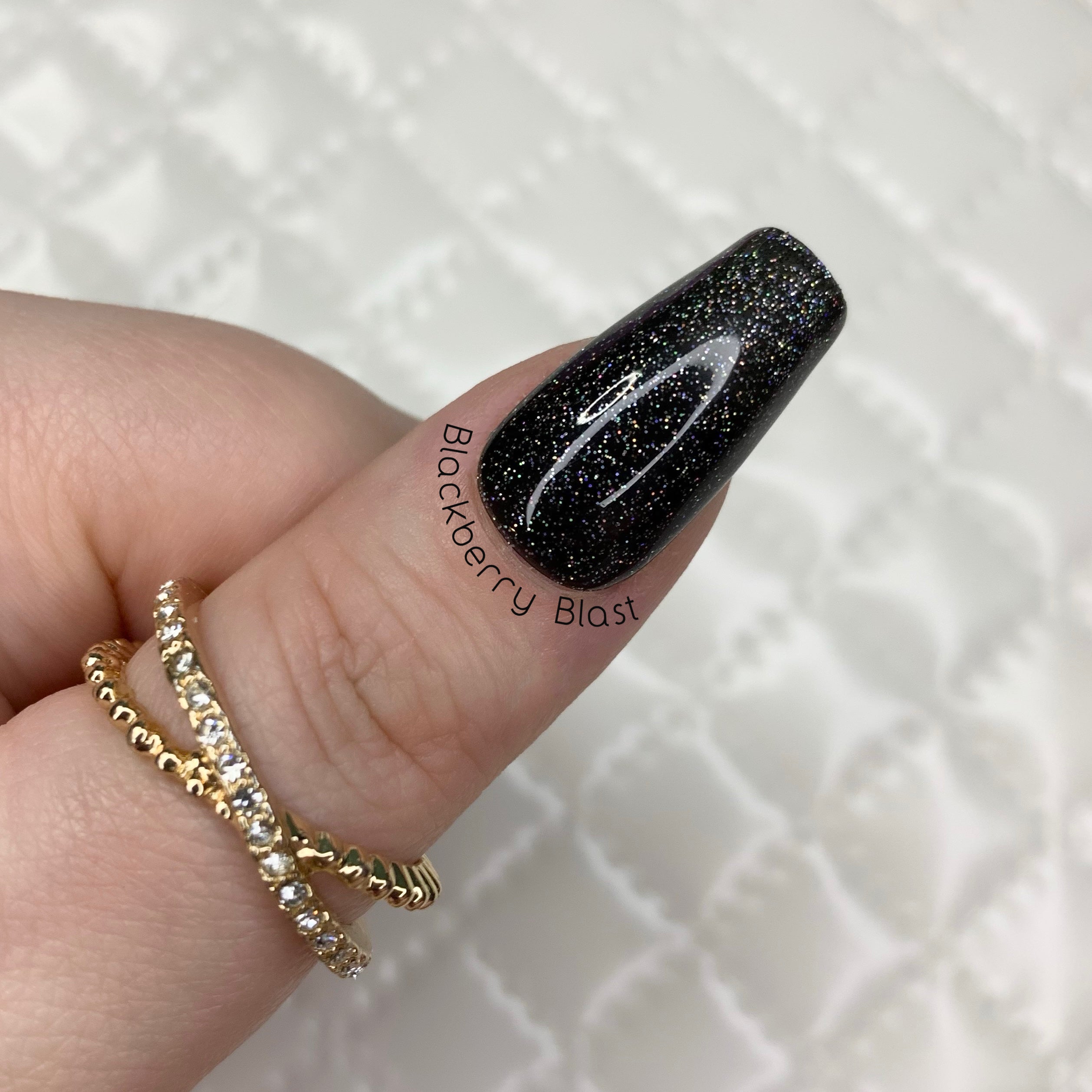 Blackberry Blast jelly press-on nails with black translucent holographic glitter finish