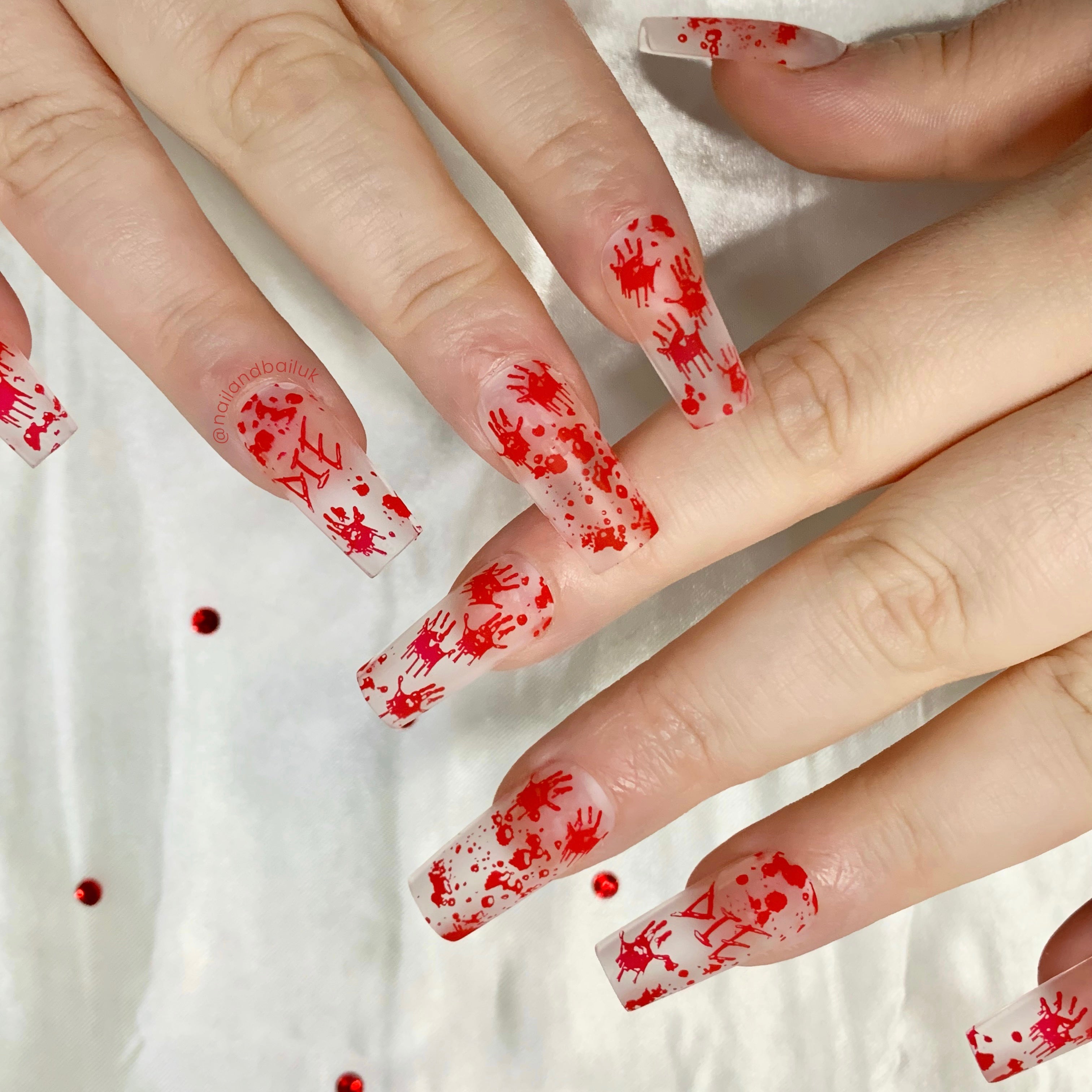 Bloody handprint nail art on matte clear horror press-on nails
