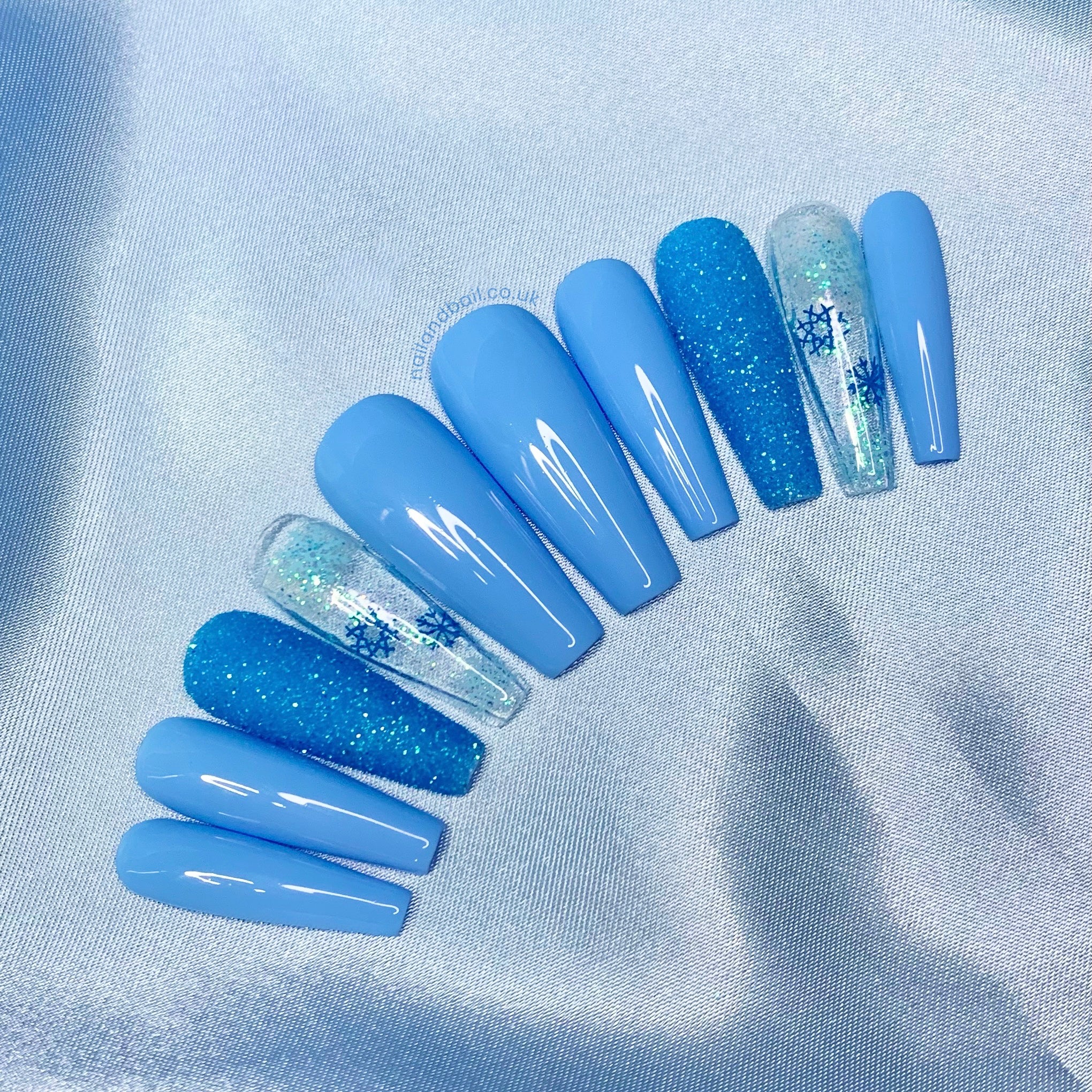 Blue sugared glitter winter press-on nails with frosted sparkle finish