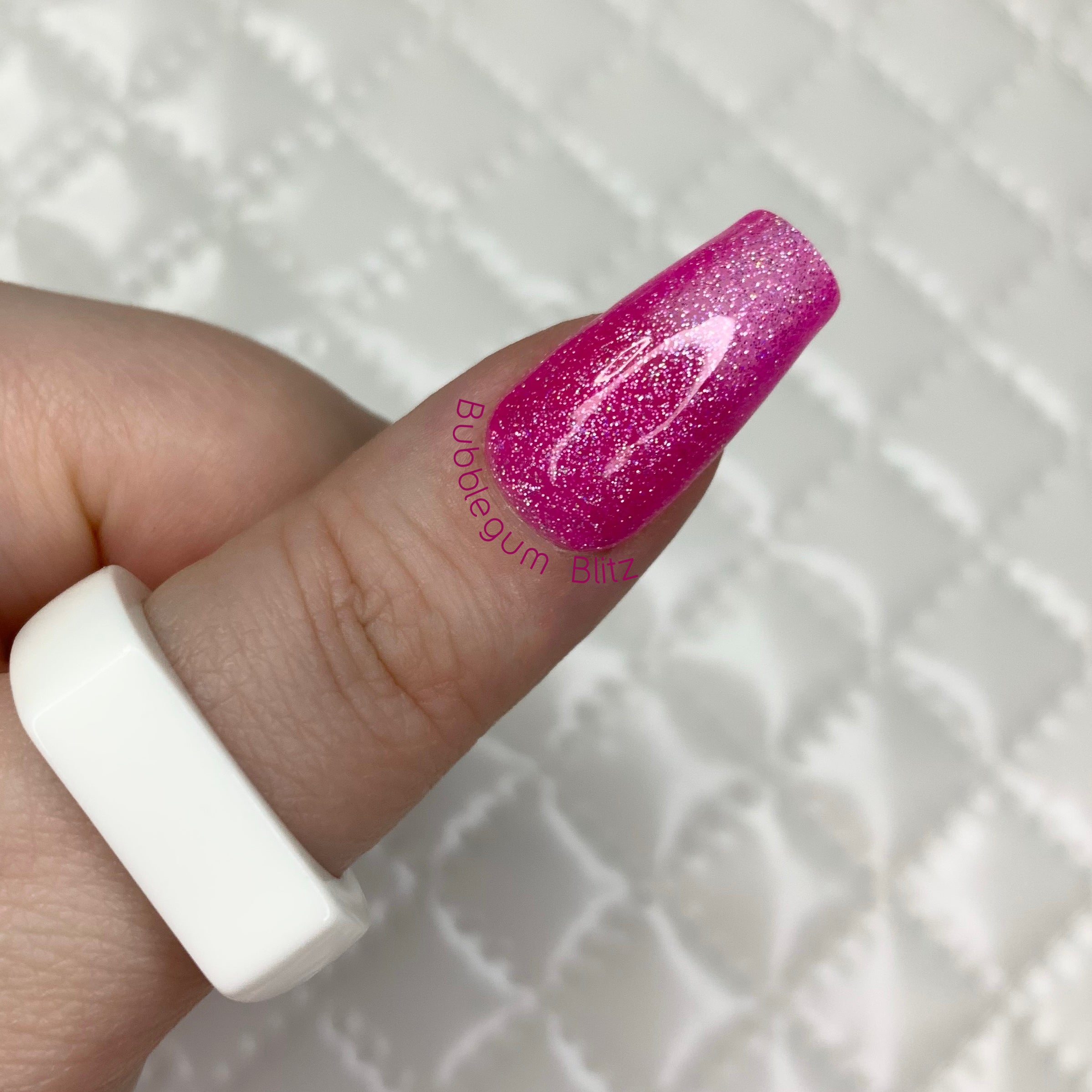 Bubblegum Blitz jelly press-on nails with vibrant pink holographic glitter finish