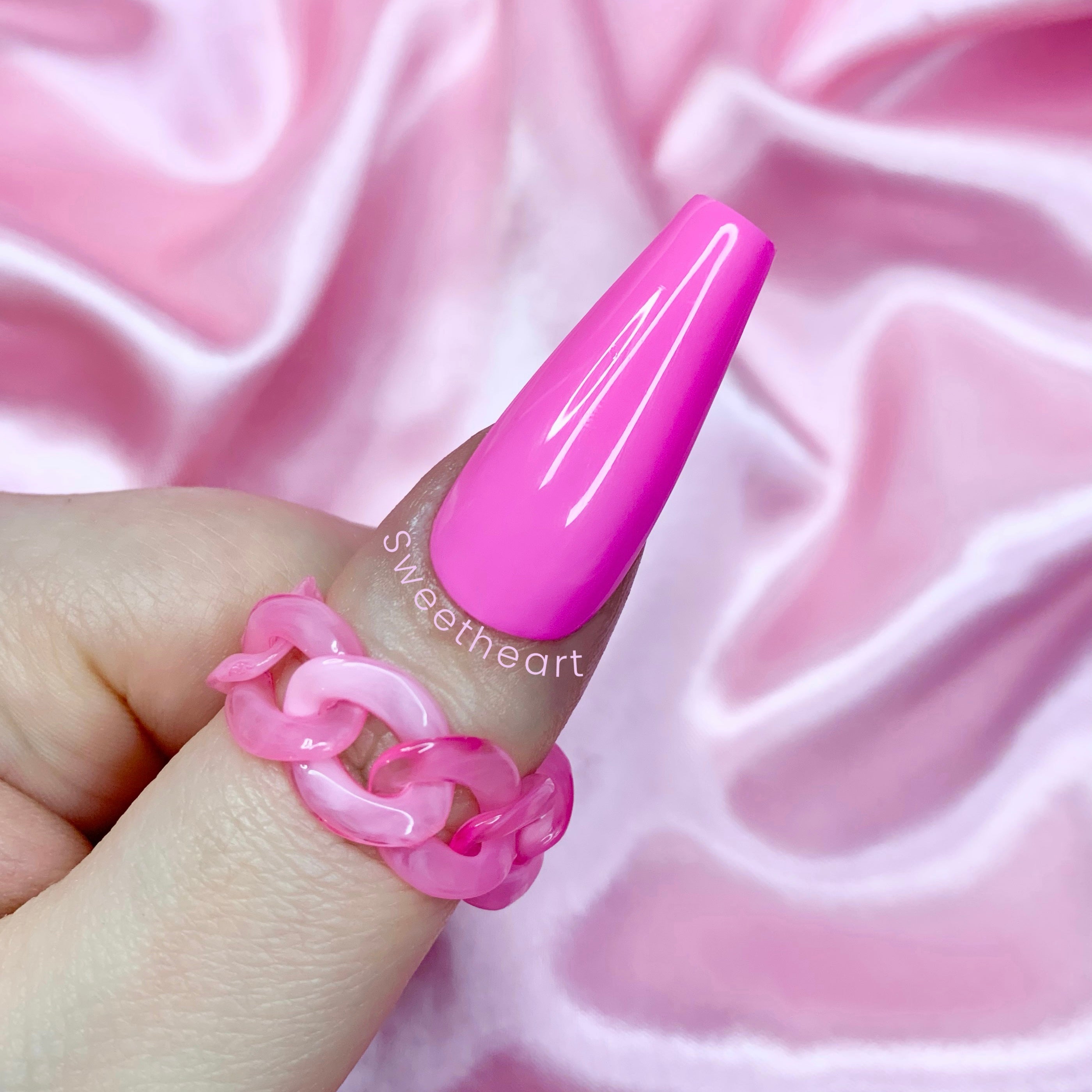 Bubblegum pink plain Valentine press-on nails with glossy salon-quality finish