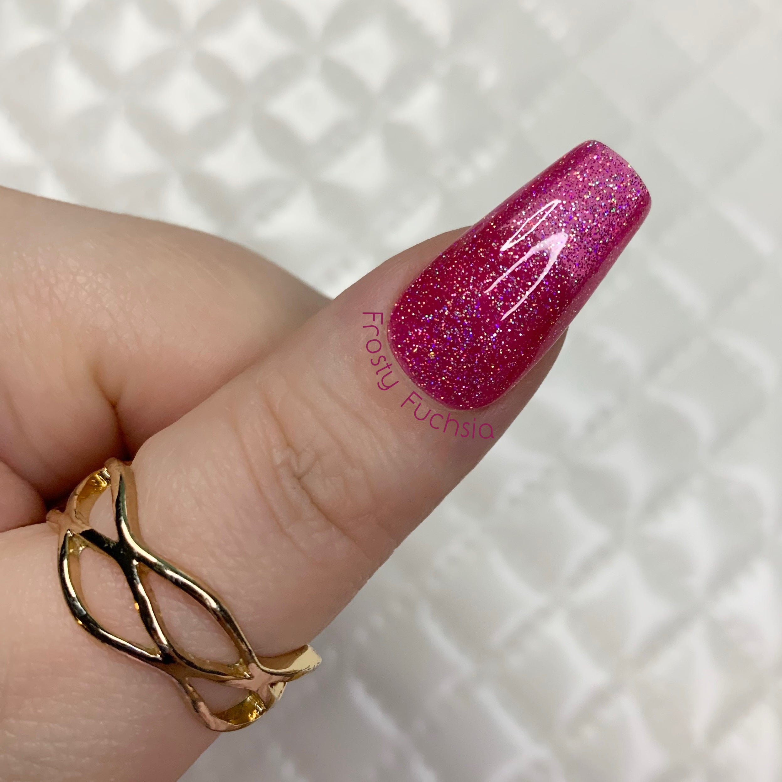 Frosty Fuchsia jelly press-on nails with deep pink translucent glitter finish