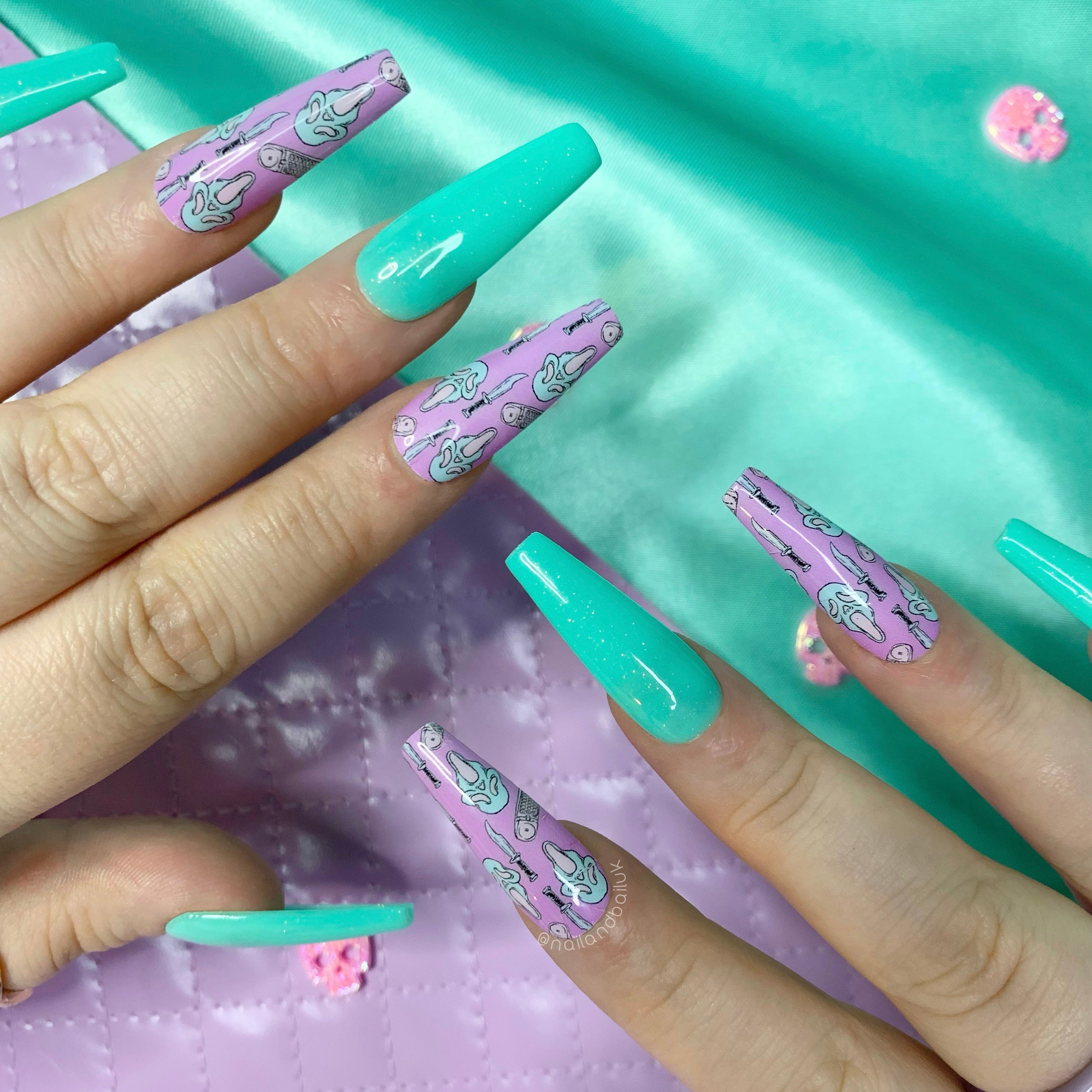 Mint glitter Halloween press-on nails with Ghostface-inspired nail art, knives, phones, and spooky purple details