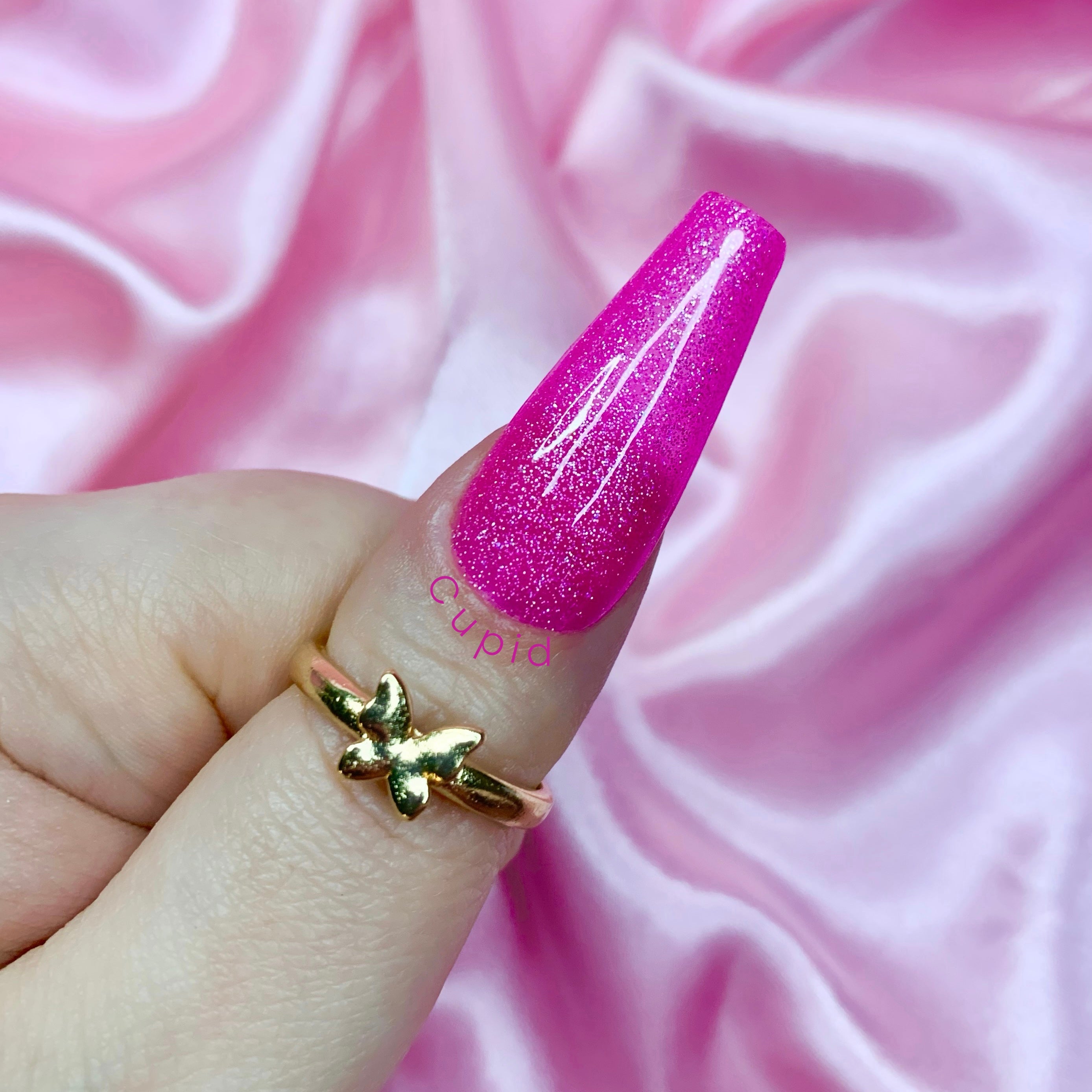 Glitter pink Valentine press-on nails with sparkling glossy glam finish