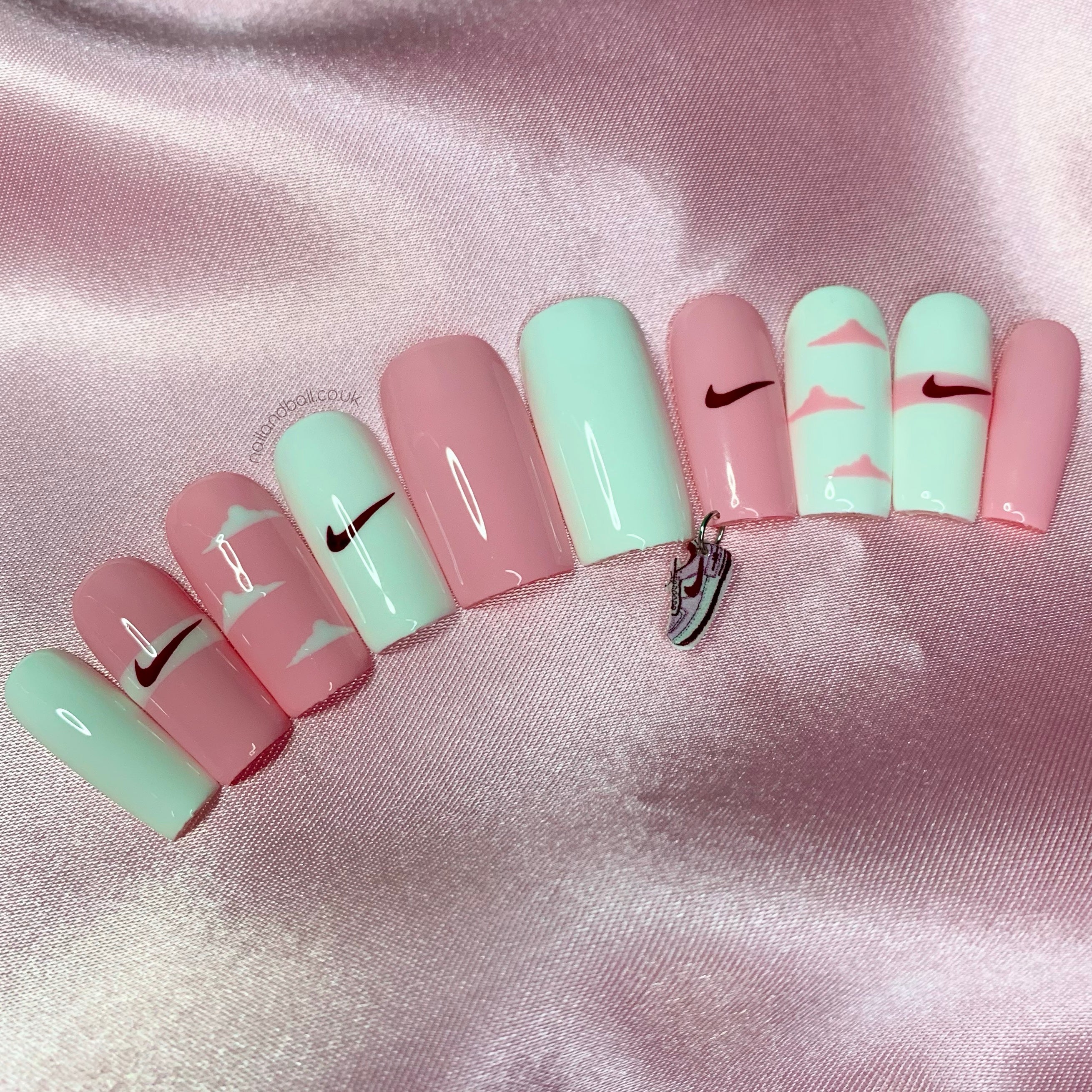 Introducing our exquisite handmade Nike sneaker nail charms - the perfect accessory to take your nail game to the next level! Crafted with attention to detail, these six charms feature miniature versions of iconic Nike sneakers, adding a touch of sporty flair to your manicure. Whether you're a sneakerhead or simply appreciate unique nail art, these charms are a must-have.