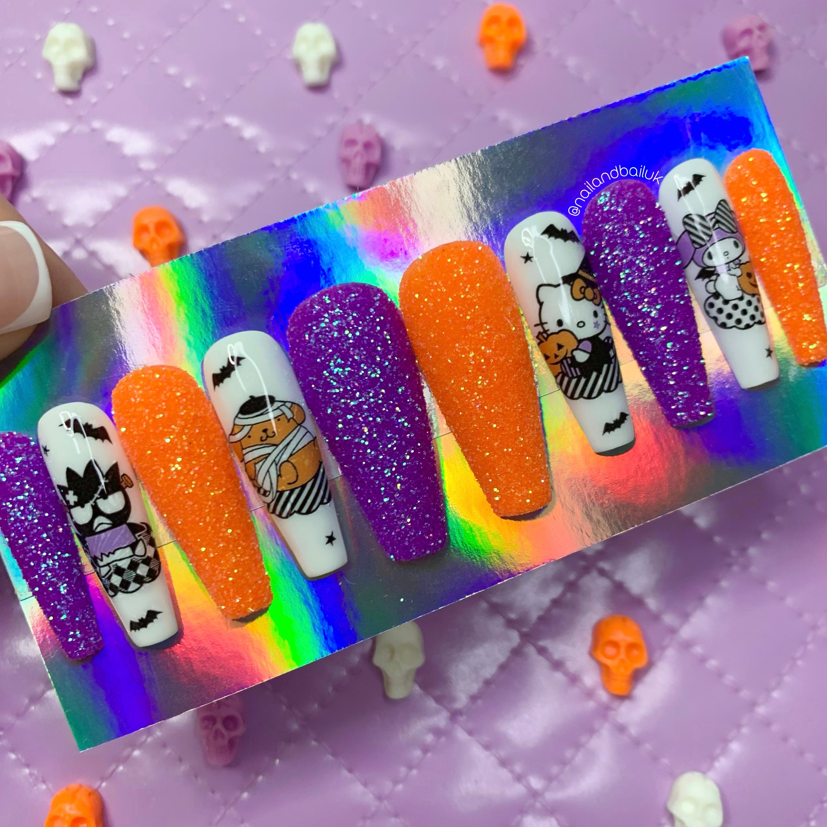 Purple and orange glitter hello kitty Halloween press on nails