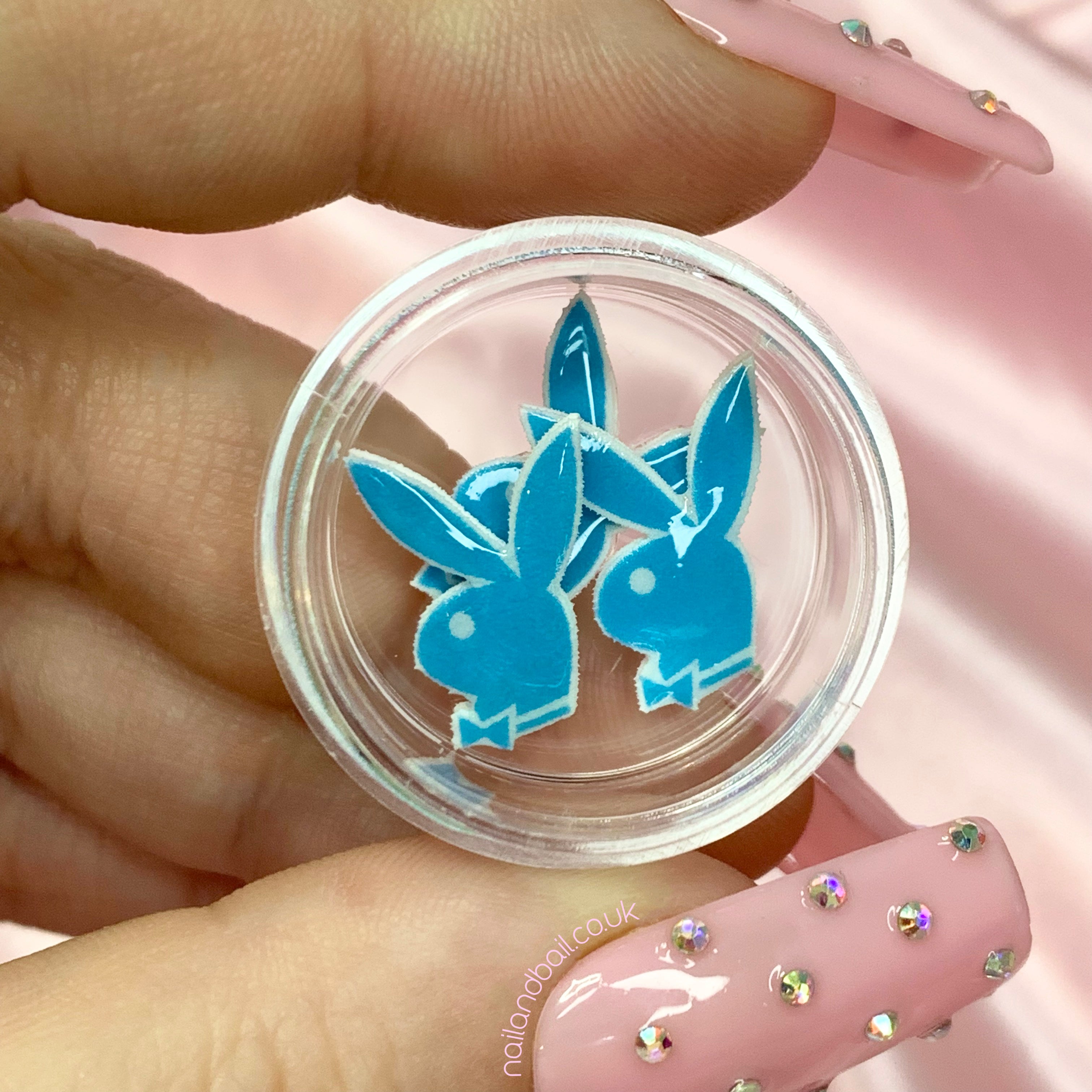 Introducing our handmade 6pcs Bright Bunny Nail Charms! Add a touch of glamour to your nails with these adorable charms, available in various colors. Perfect for any occasion, these high-quality charms are a must-have for any fashion-forward individual. Order now and take your nail game to the next level!