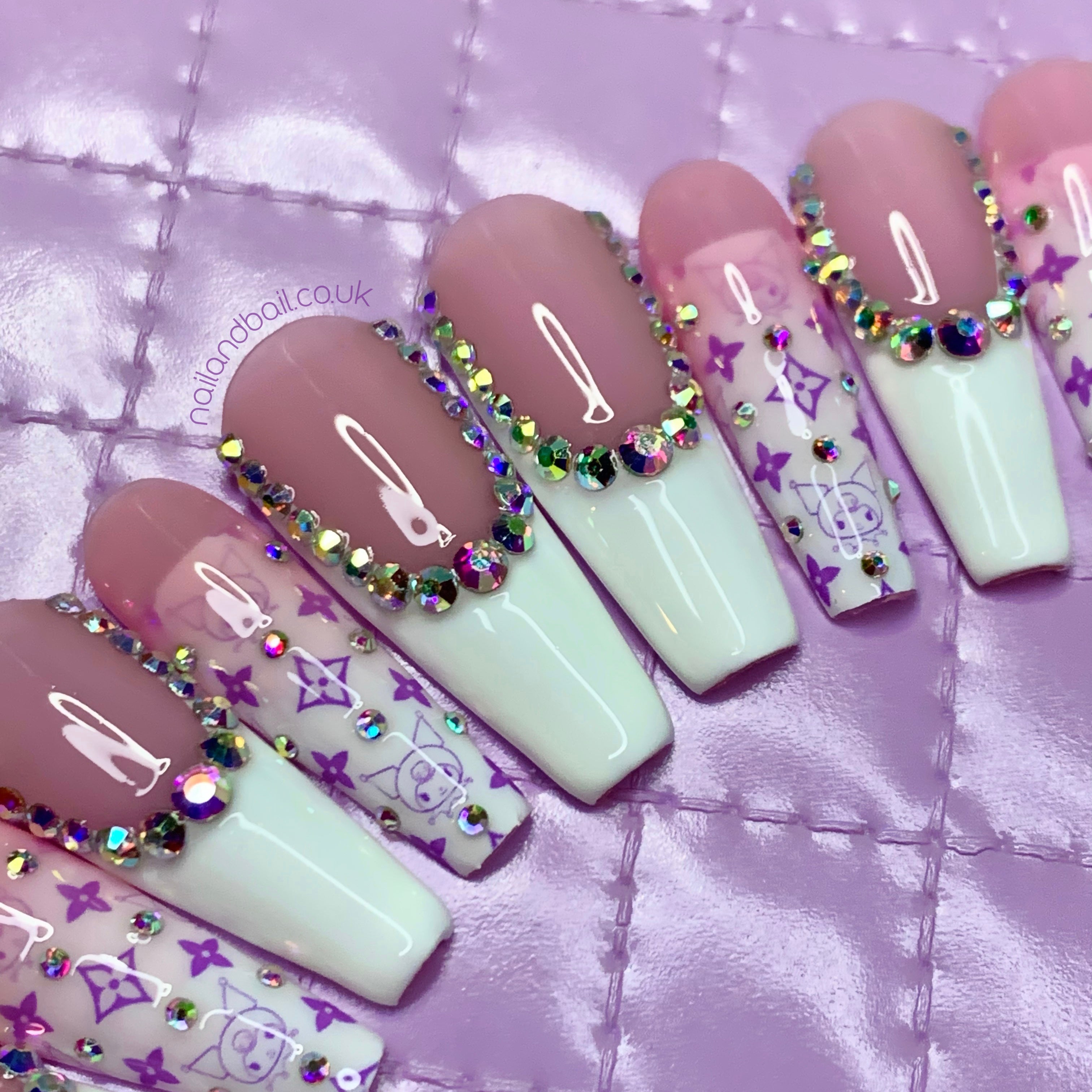 Purple Kuromi-inspired nail art on glossy kawaii press-on nails