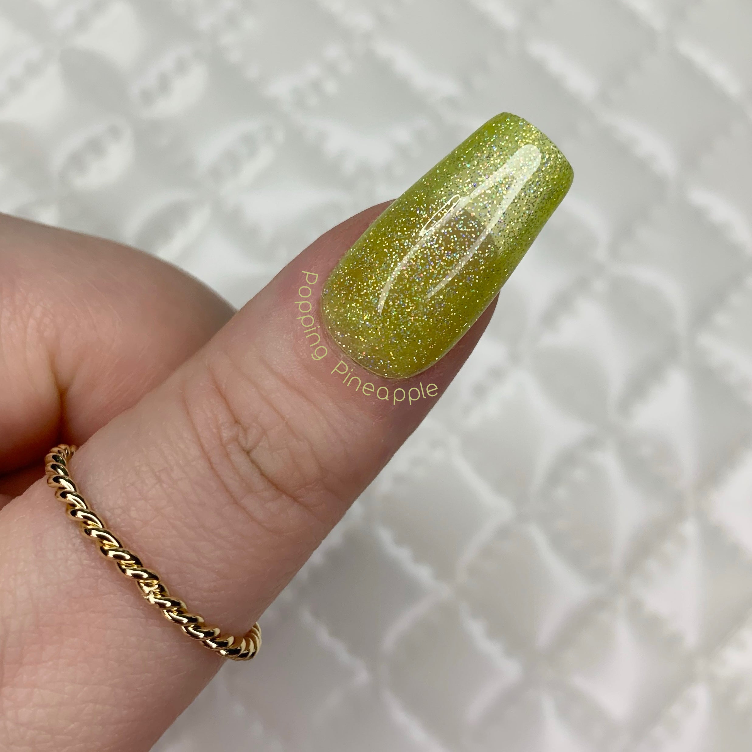 Popping Pineapple jelly press-on nails with bright yellow translucent glitter finish
